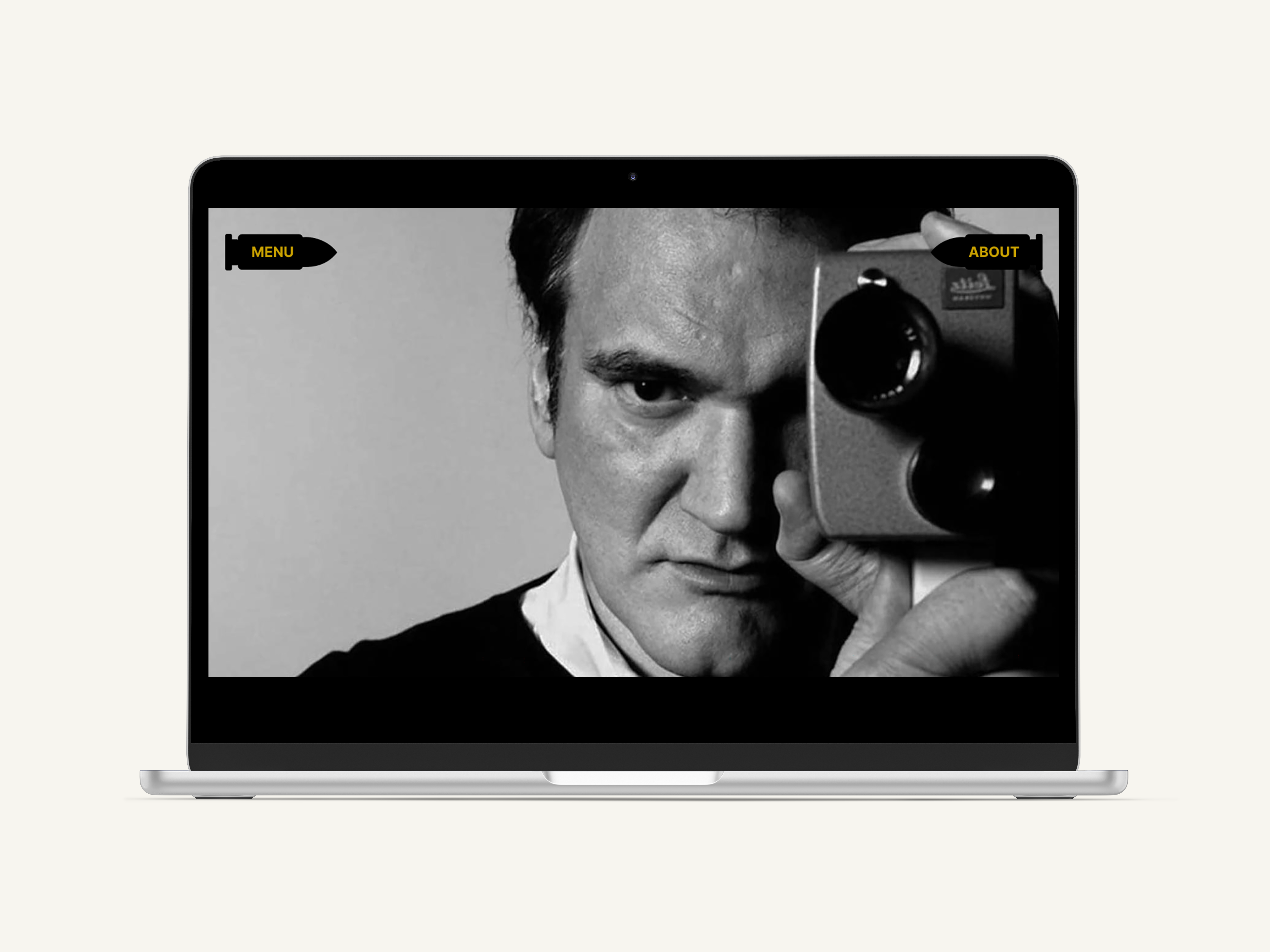 Quentin Tarantino portfolio website shown inside a laptop mockup